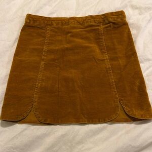 Short cotton camel colored skirt with cutout detail